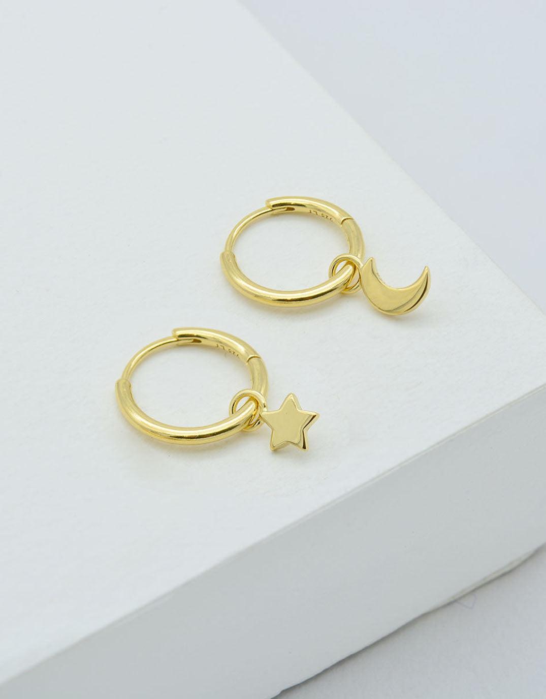 Moon store huggie earrings