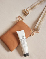 white-co-on-the-go-pouch-tan-natural-gold-stripe
