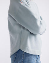 white-co-monogram-fleece-scoop-hem-sweat-light-blue-womens-clothing